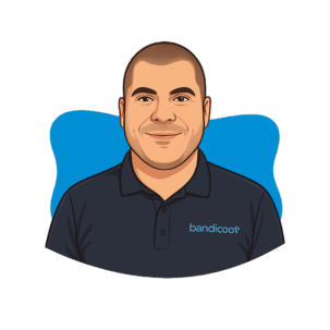 Illustrated avatar of Bandicoot IT team member Owen wearing company polo shirt